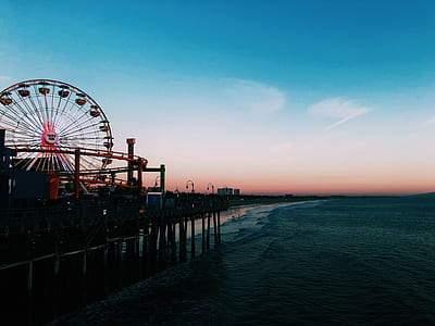 Ferris wheel near body of water thumbnail