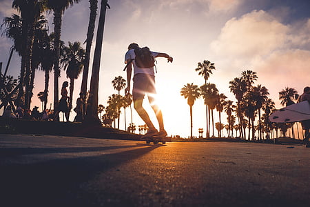man skateboarding in street thumbnail