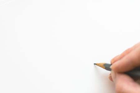 person sketching on paper thumbnail