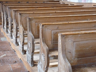 brown wooden church chairs thumbnail