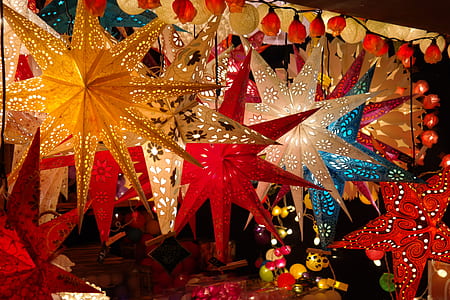 assorted-color lighted Christmas lanterns at nighttime thumbnail