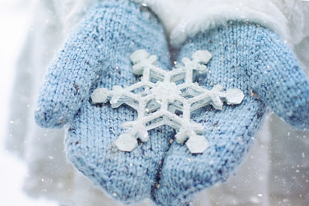 pair of blue knitted gloves thumbnail