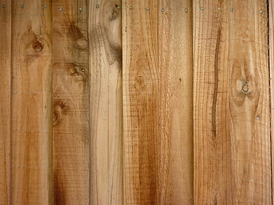 straightly lined wooden boards with nails thumbnail