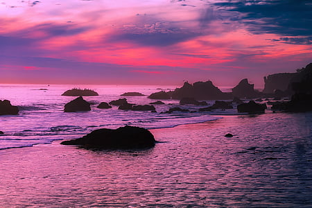 silhouette of rock and sea thumbnail
