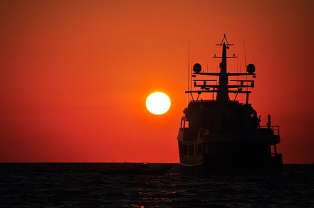 silhouette photo of ship thumbnail