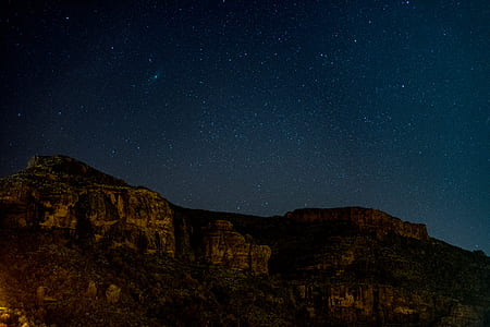 brown mountain at nighttime thumbnail
