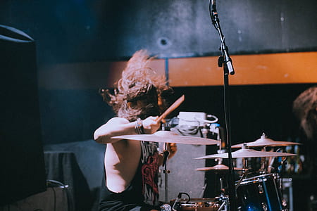 photo of man playing drum set thumbnail