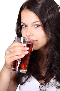 photo of woman about to drink a juice thumbnail