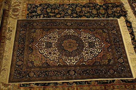 two brown and black floral area rugs thumbnail