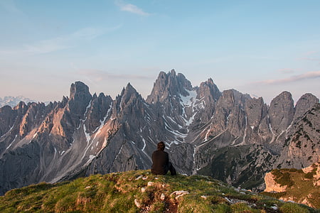 person standing on top of mountain thumbnail