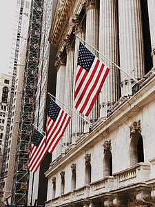 three American flags during daytime thumbnail