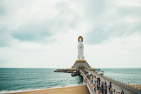 white statue on body of water thumbnail