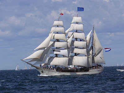 white galleon ship in the middle of body of water thumbnail