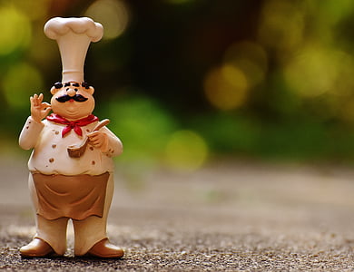 photography of selective focus male chef figurine thumbnail
