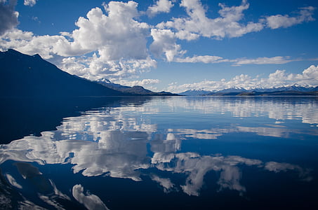 white and blue sky during daytime thumbnail