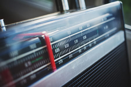 shallow focus photography of radio tuner thumbnail