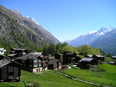 brown wooden houses during daytime thumbnail