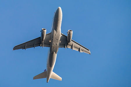 low angle photo of white and gray airliner thumbnail