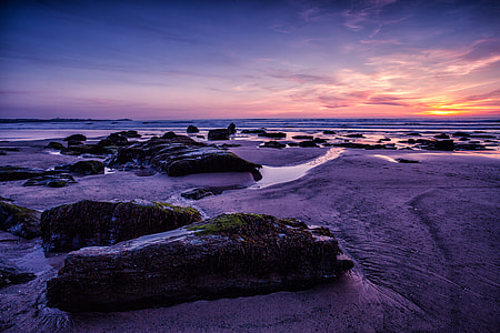Wide-angle landscape shot taken at sunset on the magnificent coast of Cornwall, England thumbnail