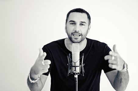 man standing in front of the microphone thumbnail