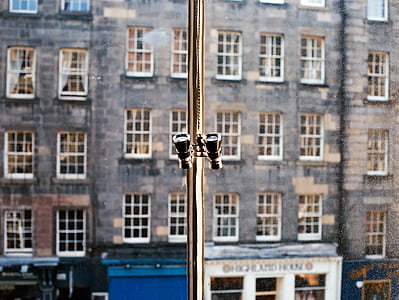 black binoculars hanged on pole thumbnail