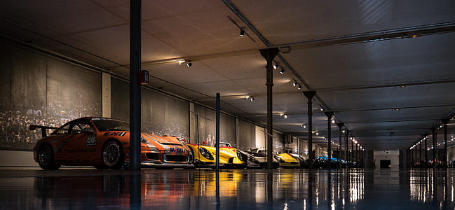 sports cars inside garage thumbnail