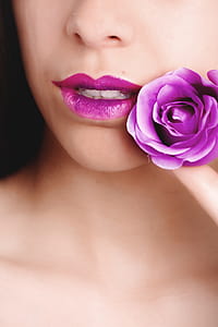 Woman With Pink Lipstick Holding Pink Rose thumbnail