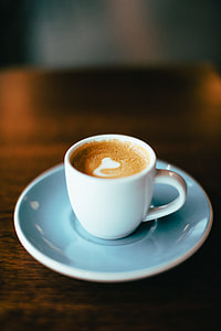 cappuccino on teacup shallow focus thumbnail