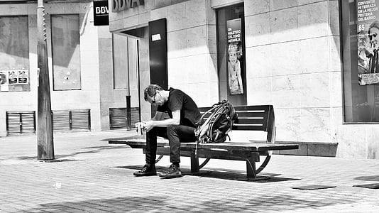 man sitting on bench thumbnail
