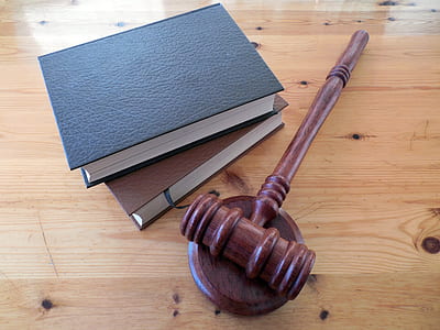 brown wooden mallet and books thumbnail