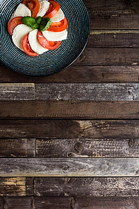 cheese and tomato on plate thumbnail