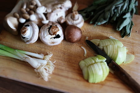 sliced vegetables on cutting board thumbnail