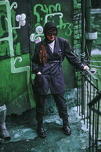 woman wearing overcoat and combat boots thumbnail