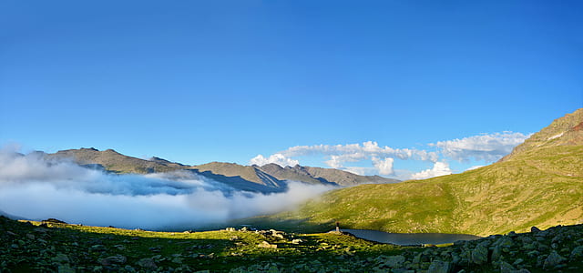 green mountain during daytime thumbnail