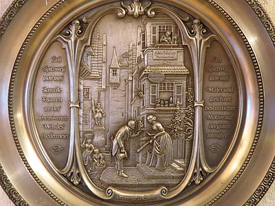 gold framed man and woman decorative plate thumbnail
