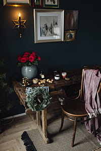 New Yorker, some nuts, watches, and other things on the old, wooden table thumbnail