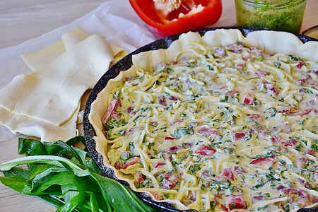pizza on black cast iron platter thumbnail