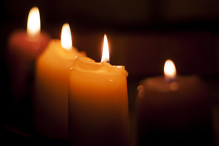 close-up photo of four candles thumbnail