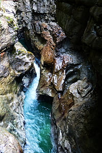 stream river between rocks thumbnail