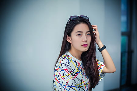 Portrait of Smiling Girl Against White Background thumbnail