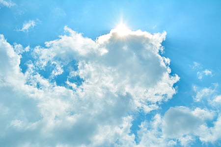 low angle photography of sun behind the clouds thumbnail