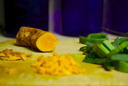 sliced ginger on white surface thumbnail