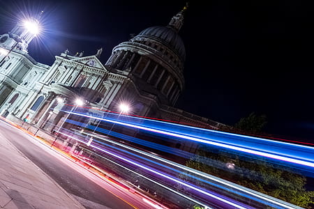 time lapse photography of street light near gray dome concrete building at nighttime thumbnail