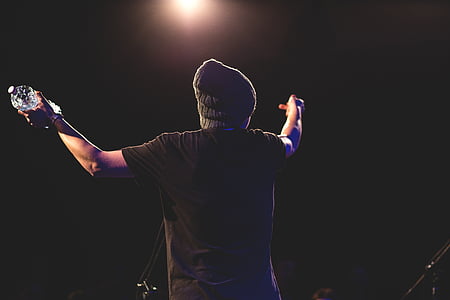 person holding plastic bottle thumbnail
