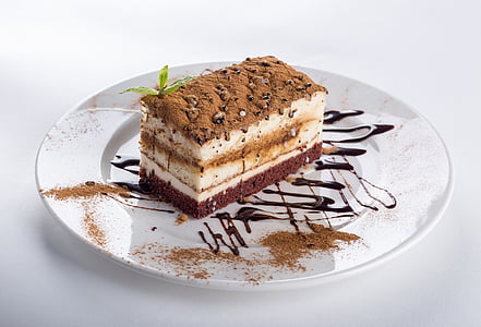 sliced of mocha cake on white ceramic plate thumbnail