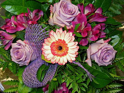 assorted flowers blooming during daytime thumbnail
