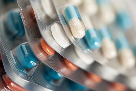 selective focus photography of assorted medical pills in blister packs thumbnail