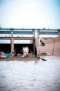 People Riding On Boat With Pakistan Flag thumbnail