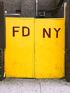closed yellow metal gate thumbnail