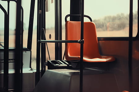 orange vehicle seat no one seating on it thumbnail